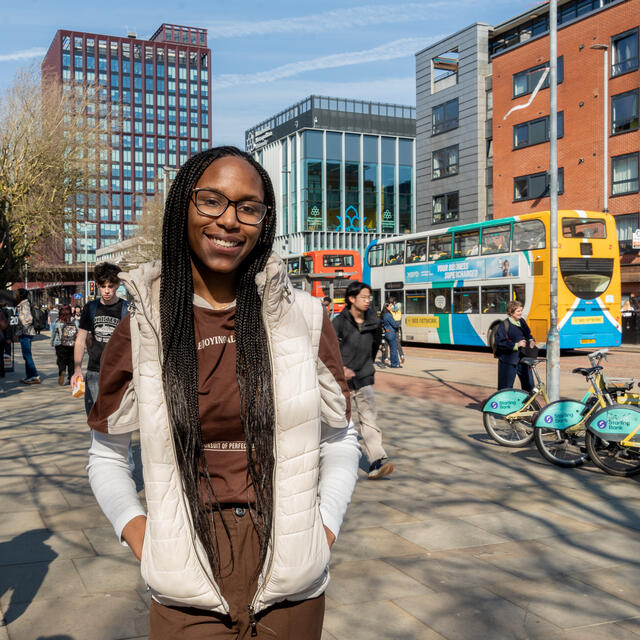 A picture of Alicia Riviere stood in central Manchester, UK