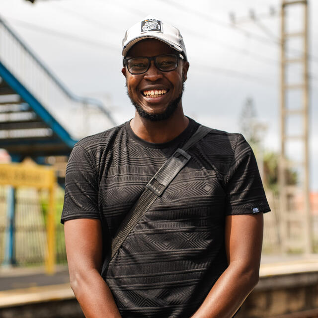 A picture of Takunda Chikomo at a station 